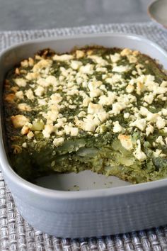 a close up of a casserole in a pan on a table