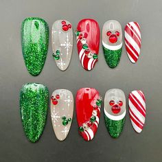 Celebrate the holidays with our Christmas Glitter Mouse Ears Press On Nails! These handmade, reusable nails feature festive red and green colors with cute mouse ear designs. Easy to apply, they're perfect for a fun, custom holiday look in both short and long styles! 🌸Thank you for supporting my small business.🌸 You can reuse all the nails you purchased from us multiple times, if you handle them with care 📦𝐖𝐡𝐚𝐭 𝐜𝐨𝐦𝐞𝐬 𝐰𝐢𝐭𝐡 𝐲𝐨𝐮𝐫 𝐩𝐫𝐞𝐬𝐬 𝐨𝐧 𝐧𝐚𝐢𝐥 𝐤𝐢𝐭? 10 𝘯𝘢𝘪𝘭𝘴 𝘰? Poly Gel Christmas Nails, Disney Christmas Nail Art Designs, Best Christmas Nail Designs, Lego Nail Art, Minnie Christmas Nails, Christmas Nail Designs Grinch, Christmas Peppermint Nails, Christmas Green Nails Acrylic, Whoville Nails