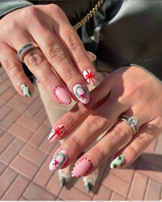 Get inspired with our festive Christmas nails ideas! Discover a variety of dazzling designs, from classic red and green holiday looks to trendy glitter and snowflake patterns. Perfect for holiday parties or cozy gatherings, these nail art ideas will add a cheerful touch to your celebrations. Whether you prefer short or long nails, we've got you covered with step-by-step guides and creative tips. Make your nails a part of your holiday cheer with these stunning Christmas nail inspirations! Mix Match Christmas Nails, Mix And Match Christmas Nails, Quirky Christmas Nails, Christmas Nails Fun, Christmas Nail Design Ideas, Christmas Cartoon Nails, Fun Christmas Nail Designs, 2024 Christmas Nails