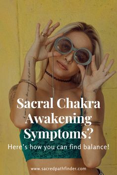 a woman with her hands on her face and the words sacral chakraa awakeing symptoms? here's how you can find balance