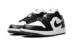 The Women’s Air Jordan 1 Low “Panda” is a women’s-exclusive version of the classic basketball shoe in the popular black-and-white colorway.  The “Panda” colorway theme rose to fame on the Nike Dunk before it began appearing on other classic sneakers like the Jordan 1 Low.  White leather appears on the shoe’s base while black leather is found on the overlays and on the Swoosh.  A white leather “Wings” logo is embroidered on the heel and a black Jumpman appears on the tongue.  Release date: March Black And White Air Jordan 1 Low, Jordan Panda, Jordan 1 Low Panda, Jordans Low, Popular Nike Shoes, Jordan Lows, Leather Wings, Sick Shoes, Black And White Jordans