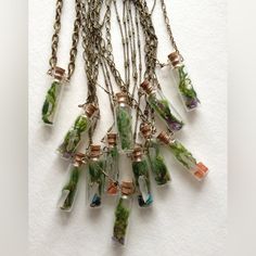 a bunch of necklaces that are on a chain