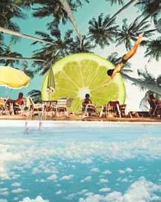 a woman diving into a pool with a lime slice in her hand and people sitting on the beach