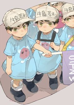 three children in blue shirts and hats are standing next to each other with their hands together