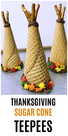 three cones with sticks sticking out of them and the words thanksgiving sugar cone teepees