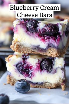 two blueberry cream cheese bars stacked on top of each other