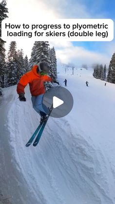 a man flying through the air while riding skis on top of snow covered ground