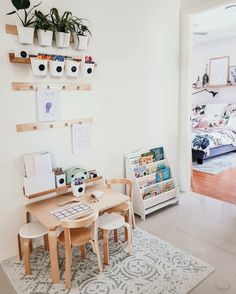 Kids art and craft space with wall storage, kids table and chairs and bookcase Kids Art Corner, Storage Ideas For Kids, Best Storage Ideas, Kids Craft Storage, Craft Organisation, Play Corner, Living Room Playroom, Toy Storage Solutions