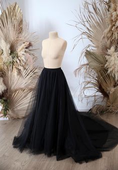 Ready to ship item, no need to waiting for production, can ship today! Description: Item Number #2168  Shadow Black Skirt with Train Waist size - 27in / 69 cm Length - 40in / 102cm Waistband option - zipper Train 40 cm Color -Black Lining: Italian silk satin soft material 50% silk, 45% viscose and 5% elastane. Material flows like a waterfall, very pleasing to the body. Please, keep in mind, measurements, noted in the listing, are of the READY MADE top, not body measurements (possible technical allowance on size about +-1-2 cm in main measurements). ALL READY TO SHIP ITEMS - https://www.etsy.com/shop/StylishBrideAtelier?ref=seller-platform-mcnav§ion_id=25371644 ALL OUR AMAZING PRODUCTS - https://www.etsy.com/shop/StylishBrideAtelier?ref=seller-platform-mcnav ✔ Handmade. Hand wash or dry cle Black Full Tulle Skirt, Flowy Black Tulle Skirt, Black Flowy Tulle Maxi Skirt, Black Tulle Skirt Layered, Black Voluminous A-line Skirt, Black Rocks, Black Skirt, Body Measurements, Silk Satin