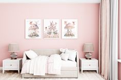 a bedroom with pink walls and two pictures on the wall above the bed, along with white nightstands