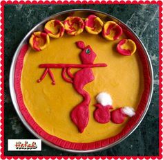 a cake decorated with red and yellow icing