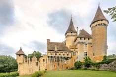 an old castle with two towers is shown