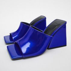 Nwt Metallic Blue Geometric Block Heel Square Toe Mule Sandal, 8 Brand New Zara Block Heel Slides In Blue, 8 Block Heel (~3.7in/9.3cm Heel Height) Slides W/ Square Toe & Shiny Metallic Effect Increased Comfort W/ Airfit Flexible Technical Sole 100% Polyurethane W/ 100% Polyester Lining, 100% Polyurethane Thermoplastic Sole & Mixture Of Sheep Leather (70%) & Polyurethane (30%) Insole Thanks For Looking!!! Blue Sandals For Spring Party, Blue Sandals For Party In Spring, Chic Blue Square Toe Mules, Blue Square Toe Mules For Summer, Modern Blue Mules For Summer, Elegant Blue Square Toe Sandals, Modern Blue Summer Mules, Blue Pointed Toe Sandals For Party, Blue Square Toe Evening Sandals