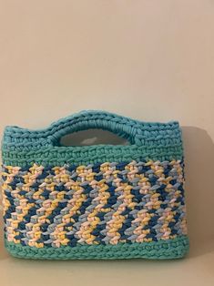 handbag is 100% handmade , made of  polyester yarn , it means that handbag is soft and light 💙☺️😊 This bag will look good any season  of year.  I hope the future owner of this bag loves it as much as I loved making it ❤️ Dimensions    Length:25 cm   height: 20cm    it's lined ✨  a perfect gift or a delightful treat for yourself ✨✨ Do not wash , clean it carefully with a damp sponge 🧽  For your different colour choice , please contact me 🥰😉 Note that actual colours may vary due to different Tote Crochet Bag, Tote Crochet, Summer Handbag, Knitted Bag, Summer Handbags, Crochet Summer, Polyester Yarn, Woven Bag, Summer Crochet