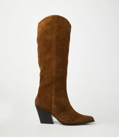 Crafted from soft suede, these pointed toe Western high boots are the perfect addition to any fall wardrobe. Pair them with jeans, skirts, or dresses for a versatile and stylish look that's perfect for the season's colors. With a sleek design and comfortable fit, these boots are a must-have. True to size Upper/Lining: Leather Heel height: 3" Platform: 0.25" Shaft Height: 17" Shaft Circumference: 14.5" Pointed toe shape Full zipper closure at inner ankle Imported Seychelles | Karen Kane Pointed T Fitted Western Suede Knee-high Boots, Western Knee-high Boots With Suede Lining For Fall, Casual Suede Heeled Boots With Snip Toe, Fall Suede Knee-high Boots With Pointed Toe, Brown Suede Knee-high Boots With Suede Lining, Suede Knee-high Boots With Pointed Toe For Fall, Fall Suede Pointed Toe Boots, Fall Suede Boots With Pointed Toe, Brown Suede Knee-high Boots With Snip Toe