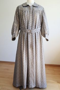 **Please enter your phone number in the 'personalisation' box. This is required by delivery services in case there is a problem with your delivery. Antique dress from the 1890s-1900s. Grey with black floral pattern, smooth cotton fabric. Medium-weight cotton bodice on the inside. No fasteners on the outside, it is a wrap-style dress fastened with a built-in belt. Still has the original basting threads needed for construction, but it is adorable so we left it as is. (The basting threads are not n Black Floral Pattern, Antique Dress, Prairie Dress, Black Floral, Floral Pattern, Inside Out, Built In, Cotton Fabric, Pattern