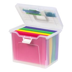 a plastic storage box filled with assorted colored pencils and paper clippings