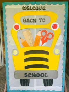 a yellow school bus with scissors and pencils on it's side is decorated with the words welcome back to school