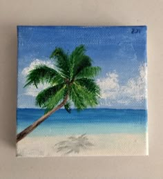 a painting of a palm tree on the beach