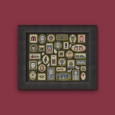 a cross - stitch pattern with many different designs on it, in a black frame