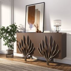 a living room scene with focus on the sideboard and plants in vases next to it