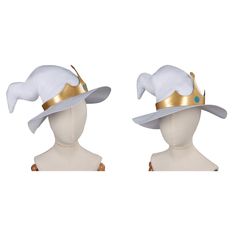 two white hats with gold trims are on top of a mannequin's head