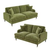 two green couches sitting next to each other