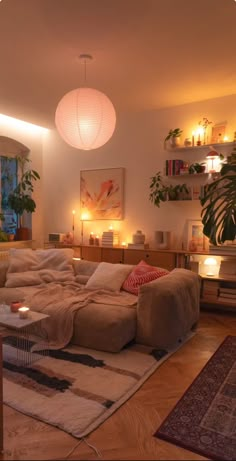 a living room filled with furniture and lights