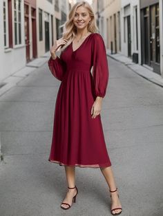 Step into any cocktail party or special event with confidence in this stunning Chiffon V-Neck Long Sleeves Elastic Band Midi Dress. The combination of the flowing chiffon fabric, v-neckline, and long sleeves exudes a classy and refined vibe. Complete your look with heels and accessories for a memorable appearance that will turn heads all night long. Fit: Please refer to size chart. Length: Midi length. Sleeve Style: Long sleeves. Closure: It is concealed a zipper up the back. Undergarments: It i Formal Fitted Chiffon V-neck Dress, Fitted Chiffon V-neck Dress For Party, Fitted Chiffon V-neck Party Dress, Elegant Flowy Chiffon Dress With Surplice Neckline, Elegant Chiffon Surplice Neckline Dress For Party, Elegant Chiffon Dress With Surplice Neckline For Party, Chiffon Party Dress With Empire Waist, Chiffon V-neck Party Dress, Chiffon Dress With Empire Waist For Party