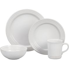 white dinnerware set with cups and saucers