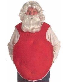 a man dressed as santa claus is standing with his hands in his pockets and wearing a red vest