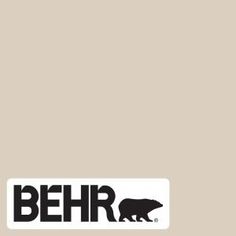 the behr logo is shown in black on a gray background, and it appears to be white