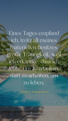 a swimming pool surrounded by palm trees with a quote from sergio hamann on it