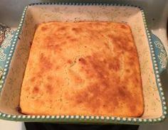 a square casserole dish sitting on top of a stove