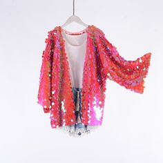 Welcome to my shop, I am in China. It will need around 30 days for international orders. Please consider the time when placing order. Sequin bohemian kimono,perfect for a casual day out. Material: mesh, sequins S size Body width: 27.5 inches(70cm), circle 55 inches(150cm) Shoulder width: 27.5 inches(70cm) Body length:25.5 inches（65cm） Sleeve length:13 inches（33cm） M size Body width: 31.5 inches(80cm), circle 63 inches(160cm) Shoulder width: 31.5 inches(80cm) Body length:25.5 inches（65cm） Sleeve Sequin Dress For Summer Festivals, Spring Party Pink Kimono, Summer Festive Sequin Dress With Contrast Sequin, Summer Long Sleeve Sequin Dress With Contrast, Festive Summer Sequin Dress With Contrast Sequin, Spring Sequin Fabric For Night Out, Glamorous Sequin Fabric For Festive Spring Occasions, Spring Disco Sequin Dress, Multicolor Disco Sequin Dress For Summer