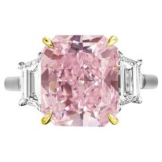 A truly remarkable piece of fine jewelry: an exquisite GIA Certified 8 Carat Fancy Brown Pink Diamond Ring, elegantly set with two trapezoids, nestled within a combination of solid platinum and 18 carats yellow gold. This extraordinary ring features a main stone certified by GIA, ensuring its authenticity and quality. The captivating hues of the Fancy Brown Pink diamond are complemented perfectly by the brilliance of the trapezoid side stones. Crafted with meticulous attention to detail, the combination of platinum and 18 carats yellow gold adds a touch of luxury and sophistication to this stunning piece. Elevate your style with this unique and elegant Fancy Brown Pink Diamond Ring, a testament to exquisite craftsmanship and timeless beauty. Fancy Pink Diamond Ring, Flawless Diamond Ring, Dig Jewelry, Oval Halo Diamond Ring, Heart Shaped Diamond Ring, Pear Cut Diamond Ring, Pink Diamond Engagement Ring, Oval Cut Diamond Rings, Stunning Aesthetic