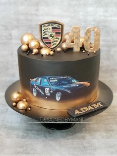 a birthday cake decorated with an image of a car and the number forty on it