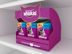 the display case for whiska's cat food is purple and has kitten ears on it