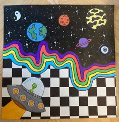 an art project with space and planets painted on it