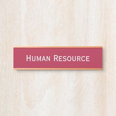 a red sign that says human resources on it's wood background with the word human resources in white letters