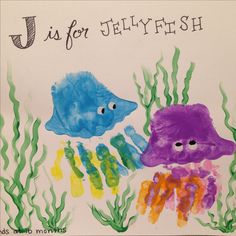 a child's drawing of two jellyfish in the ocean with words u is for jellyfish