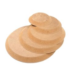 four round wooden coasters stacked on top of each other in the shape of circles