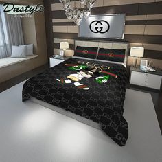 a bed room with a neatly made bed and a chandelier