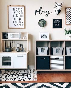 a playroom with shelves, bins and baskets on the floor