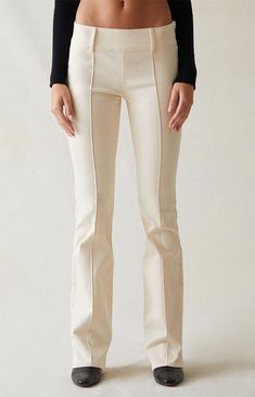 PacSun brings a touch of retro charm to your next look with the Stretch Cream Low Rise Flare Pants. These figure-flattering pants seamlessly blend a trendy low-rise design with center seam details down the legs and flattering flared leg openings, adding a vintage-inspired twist to your wardrobe in a versatile cream colorway. Flare Cream Pants, Cream Fitted Mid-rise Bottoms, Fitted Mid-rise Cream Pants, Cream Low Rise Pants, Low Rise Flare Pants, Pacsun Pants, Cream Pants, Low Rise Pants, Flattering Pants