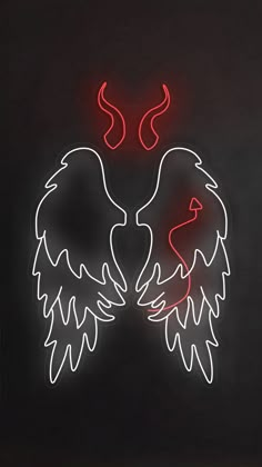 two angel wings with red and white neon lights in the shape of hearts on a black background