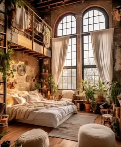 an industrial bedroom with exposed brick walls and large windows, lots of natural greenery