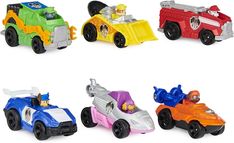 four toy cars are shown in different colors