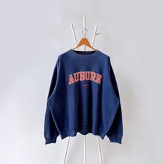 90s Nike X Auburn University Tigers sweatshirt/ XL * PLEASE READ BEFORE PURCHASE * PLEASE consider the PHOTOS before making the decision * The images may DIFFER in appearance from the actual product because we took pictures under daylight.  * PLEASE send your PHONE NUMBER after your purchase for the shipping company to contact you X No returns X No refund Condition : 9/10 More details : look at the pictures  Brand : Nike Size : XL Pit to pit/ Chests : 29.5/59 inches  Length : 29 inches  Material : cotton polyester  Color : blue  * ALL ITEMS are VINTAGE which may show some signs of wear and tear * Due to the different display and different light, the picture may not reflect the actual color of the item * Please, remember that our items are vintage so they may show some signs of wear, tear a Oversized Throwback Sweatshirt For Fall, Throwback Oversized Crew Sweatshirt, Oversized Throwback Crew Sweatshirt, Oversized Crew Neck Throwback Sweatshirt, 90s Long Sleeve Sweatshirt For Fall, 90s Style Long Sleeve Fall Sweatshirt, 90s Long Sleeve Fall Sweatshirt, Oversized Throwback Sweatshirt For Winter, Winter Oversized Throwback Sweatshirt