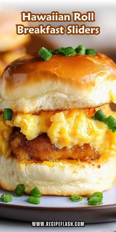 the hawaiian roll breakfast sliders are loaded with eggs, bacon, and melted cheese